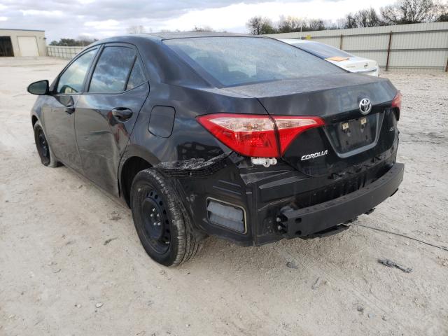 Photo 2 VIN: 5YFBURHE4KP888049 - TOYOTA COROLLA L 