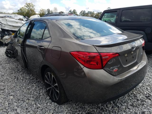 Photo 2 VIN: 5YFBURHE4KP889556 - TOYOTA COROLLA L 