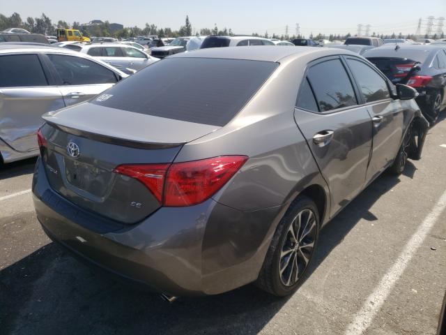 Photo 3 VIN: 5YFBURHE4KP894238 - TOYOTA COROLLA L 