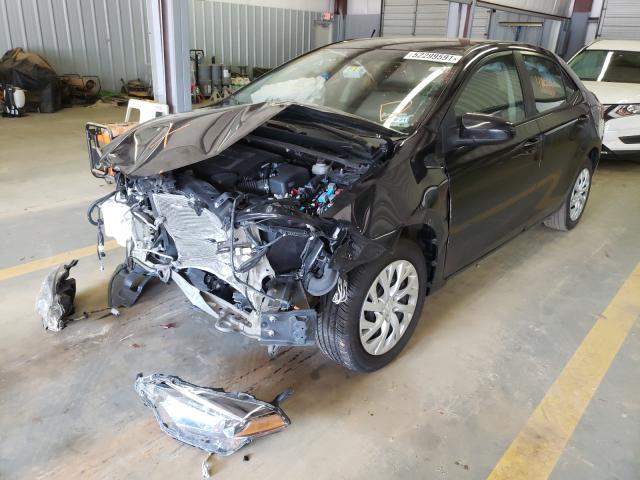 Photo 1 VIN: 5YFBURHE4KP895079 - TOYOTA COROLLA L 