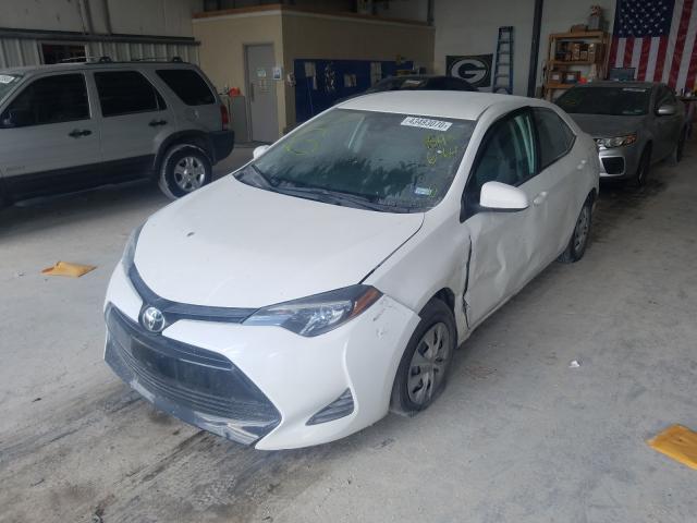 Photo 1 VIN: 5YFBURHE4KP895664 - TOYOTA COROLLA L 