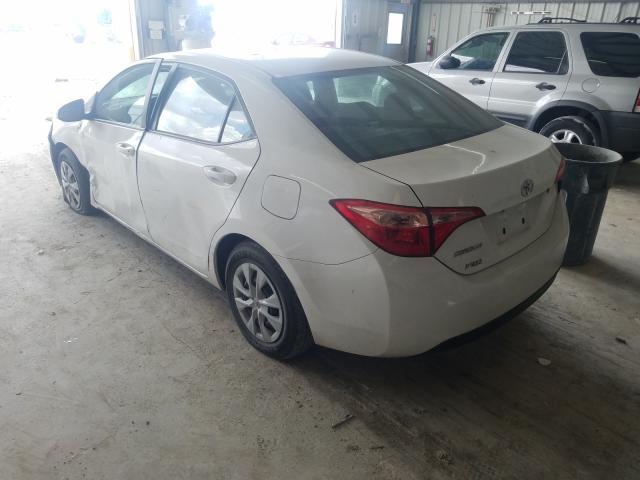 Photo 2 VIN: 5YFBURHE4KP895664 - TOYOTA COROLLA L 