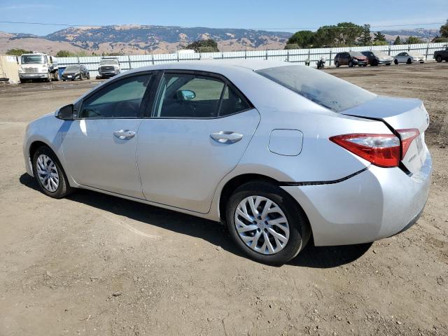 Photo 1 VIN: 5YFBURHE4KP896801 - TOYOTA COROLLA L 