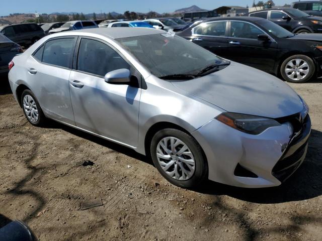 Photo 3 VIN: 5YFBURHE4KP896801 - TOYOTA COROLLA L 