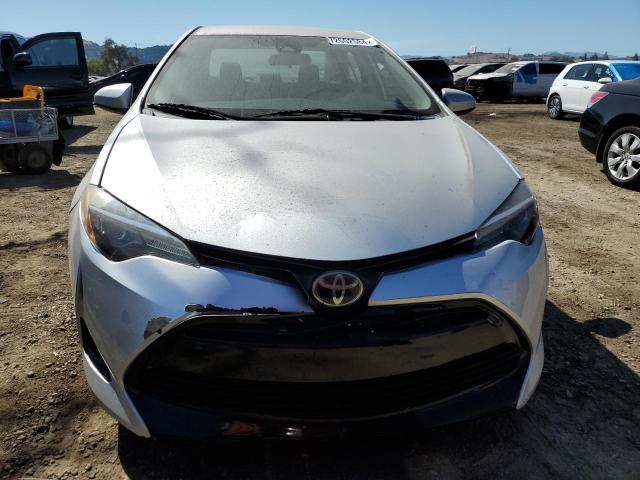 Photo 4 VIN: 5YFBURHE4KP896801 - TOYOTA COROLLA L 