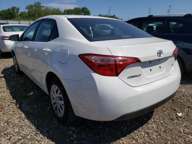 Photo 2 VIN: 5YFBURHE4KP899181 - TOYOTA COROLLA L 