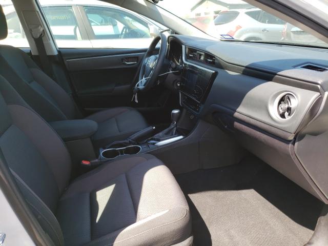 Photo 4 VIN: 5YFBURHE4KP899181 - TOYOTA COROLLA L 