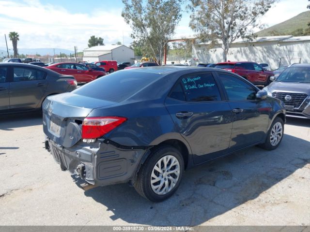 Photo 3 VIN: 5YFBURHE4KP906419 - TOYOTA COROLLA 