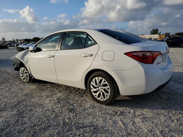 Photo 1 VIN: 5YFBURHE4KP907585 - TOYOTA COROLLA L 