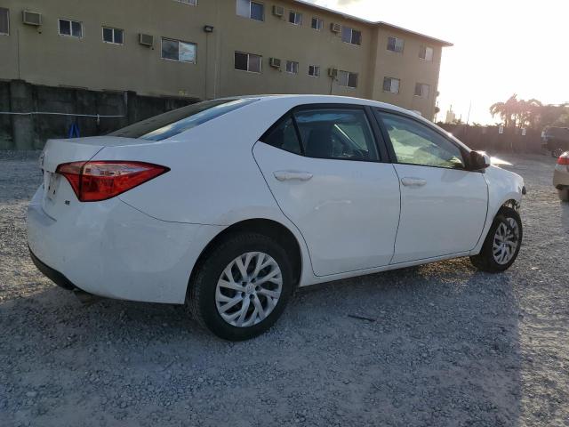 Photo 2 VIN: 5YFBURHE4KP907585 - TOYOTA COROLLA L 