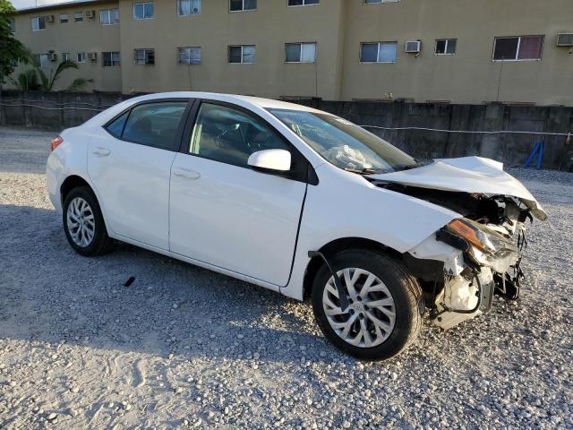 Photo 3 VIN: 5YFBURHE4KP907585 - TOYOTA COROLLA L 