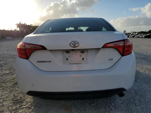 Photo 5 VIN: 5YFBURHE4KP907585 - TOYOTA COROLLA L 