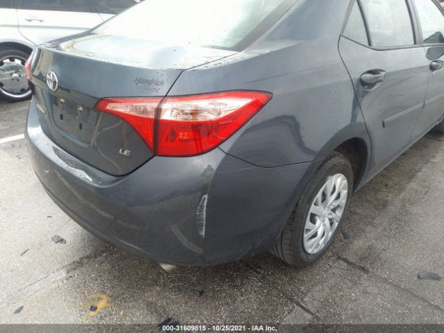 Photo 5 VIN: 5YFBURHE4KP907781 - TOYOTA COROLLA 