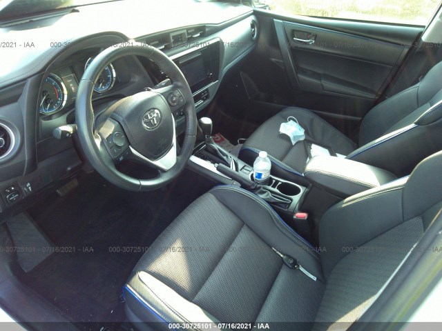 Photo 4 VIN: 5YFBURHE4KP916030 - TOYOTA COROLLA 