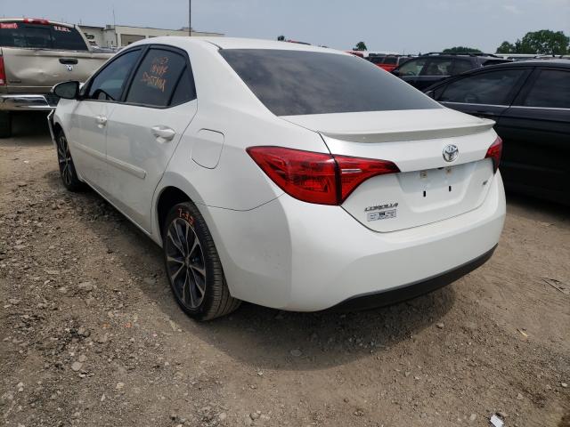 Photo 2 VIN: 5YFBURHE4KP926864 - TOYOTA COROLLA L 