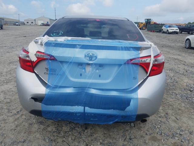 Photo 8 VIN: 5YFBURHE5EP125302 - TOYOTA COROLLA L 