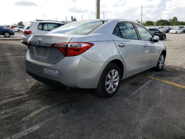 Photo 3 VIN: 5YFBURHE5EP129737 - TOYOTA COROLLA L 