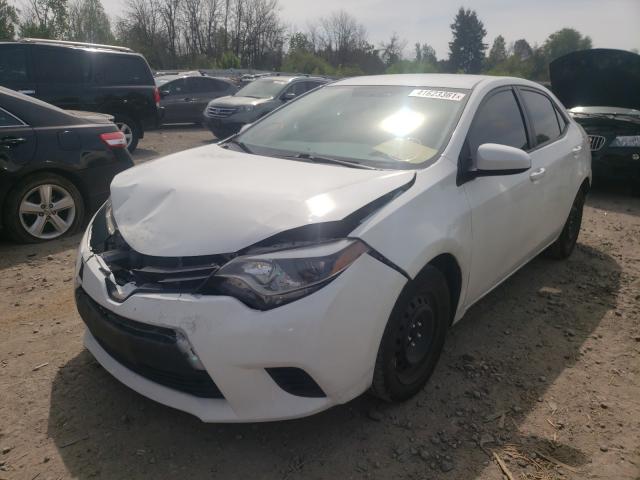 Photo 1 VIN: 5YFBURHE5EP138003 - TOYOTA COROLLA L 