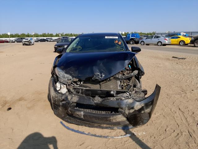 Photo 8 VIN: 5YFBURHE5FP253055 - TOYOTA COROLLA L 