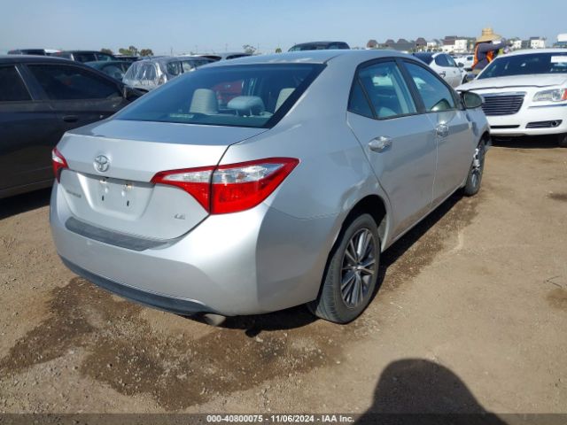 Photo 3 VIN: 5YFBURHE5GP395231 - TOYOTA COROLLA 