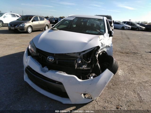 Photo 5 VIN: 5YFBURHE5GP426963 - TOYOTA COROLLA 