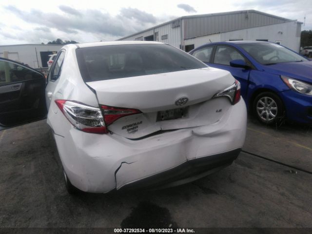 Photo 5 VIN: 5YFBURHE5GP513309 - TOYOTA COROLLA 