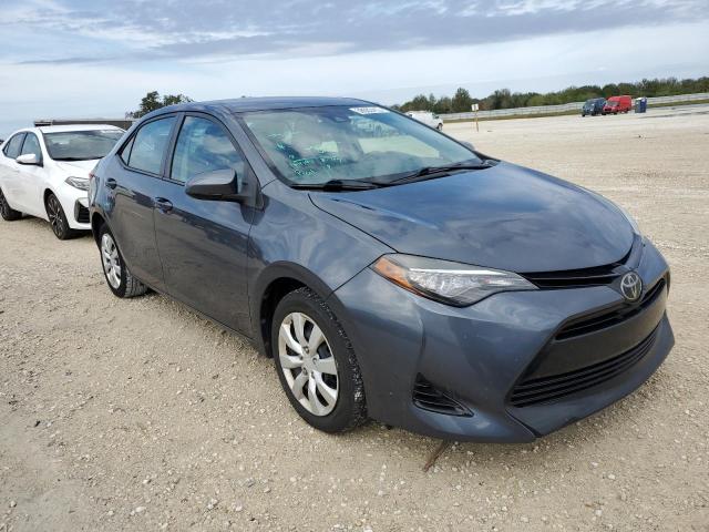 Photo 3 VIN: 5YFBURHE5HP602072 - TOYOTA COROLLA L 