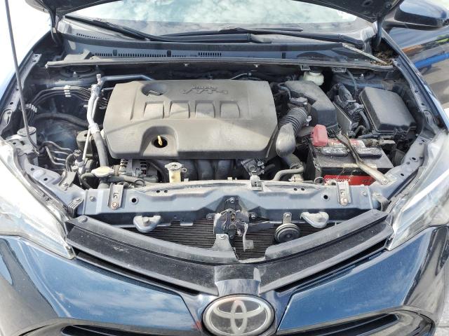 Photo 10 VIN: 5YFBURHE5HP606669 - TOYOTA COROLLA L 