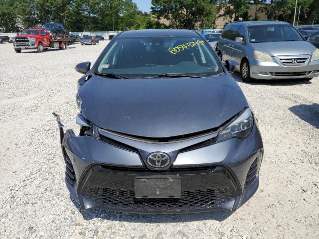 Photo 4 VIN: 5YFBURHE5HP609183 - TOYOTA COROLLA L 