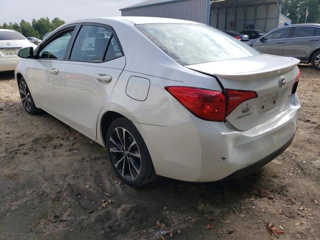 Photo 2 VIN: 5YFBURHE5HP613413 - TOYOTA COROLLA L 