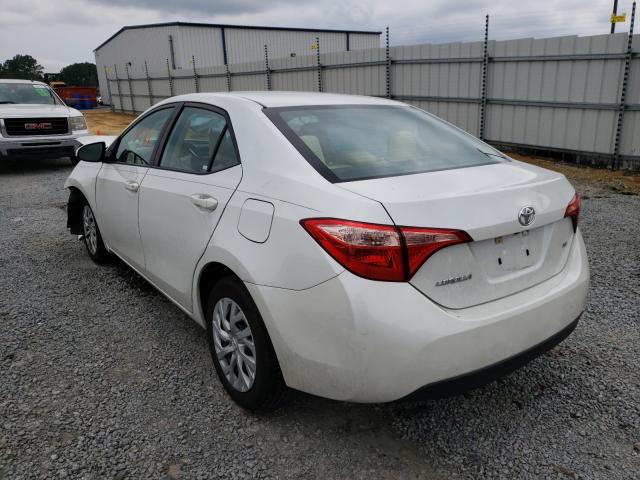 Photo 2 VIN: 5YFBURHE5HP617560 - TOYOTA COROLLA L 