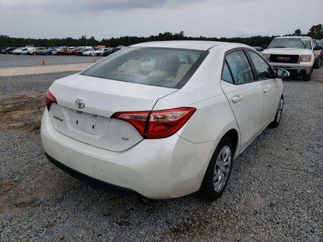 Photo 3 VIN: 5YFBURHE5HP617560 - TOYOTA COROLLA L 