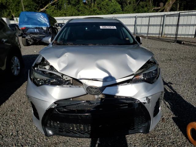 Photo 4 VIN: 5YFBURHE5HP622399 - TOYOTA COROLLA L 