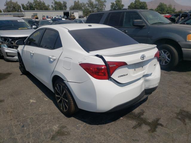 Photo 2 VIN: 5YFBURHE5HP627683 - TOYOTA COROLLA L 