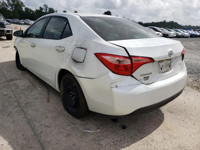 Photo 2 VIN: 5YFBURHE5HP648064 - TOYOTA COROLLA L 