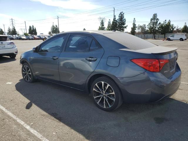 Photo 1 VIN: 5YFBURHE5HP667276 - TOYOTA COROLLA L 