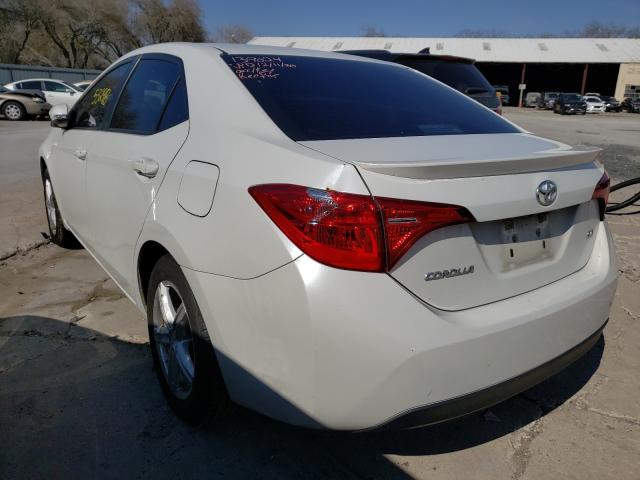 Photo 2 VIN: 5YFBURHE5HP681467 - TOYOTA COROLLA L 