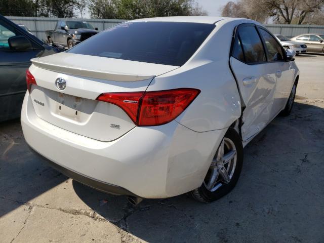 Photo 3 VIN: 5YFBURHE5HP681467 - TOYOTA COROLLA L 