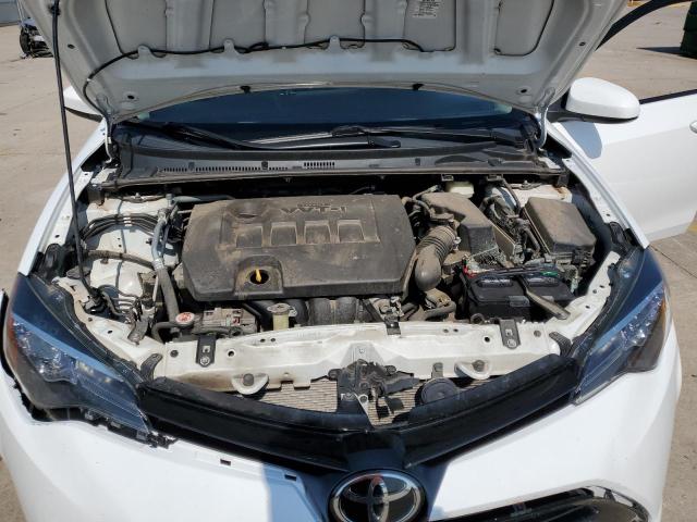 Photo 10 VIN: 5YFBURHE5HP682263 - TOYOTA COROLLA L 