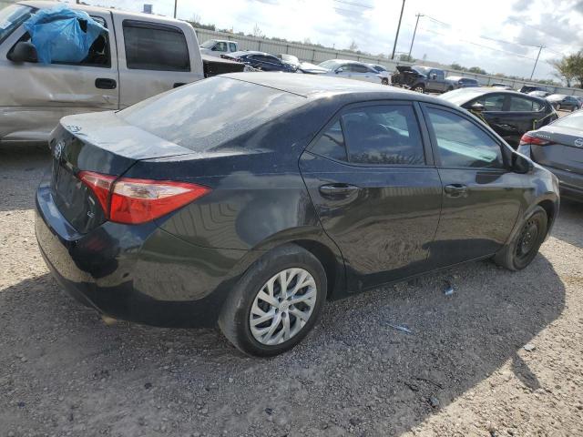 Photo 2 VIN: 5YFBURHE5HP690587 - TOYOTA COROLLA L 