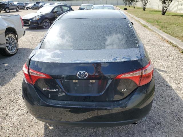 Photo 5 VIN: 5YFBURHE5HP690587 - TOYOTA COROLLA L 