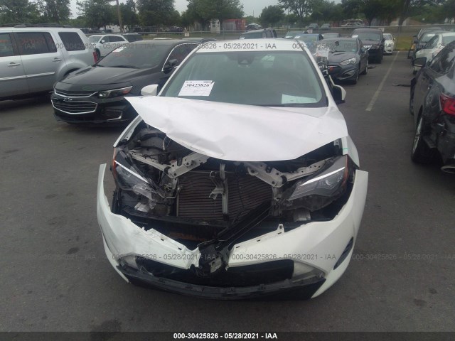 Photo 5 VIN: 5YFBURHE5HP695725 - TOYOTA COROLLA 