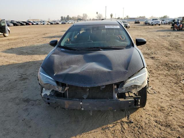 Photo 4 VIN: 5YFBURHE5HP695871 - TOYOTA COROLLA L 