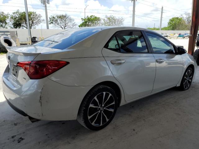 Photo 2 VIN: 5YFBURHE5HP696020 - TOYOTA COROLLA L 