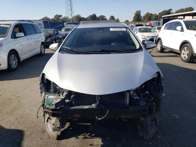 Photo 4 VIN: 5YFBURHE5HP697717 - TOYOTA COROLLA L 