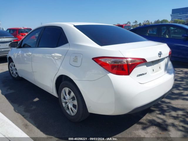 Photo 2 VIN: 5YFBURHE5HP699211 - TOYOTA COROLLA 