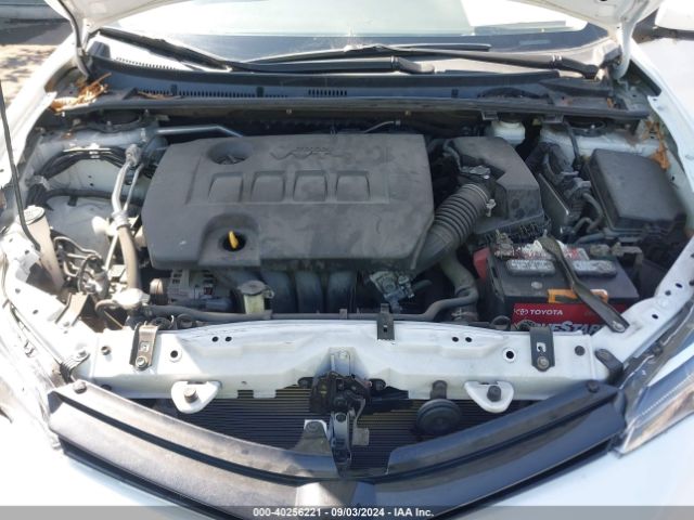 Photo 9 VIN: 5YFBURHE5HP699211 - TOYOTA COROLLA 