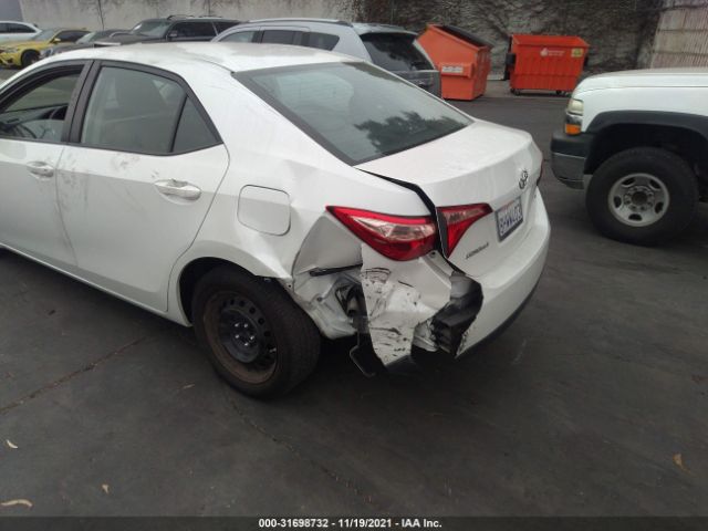 Photo 5 VIN: 5YFBURHE5HP729257 - TOYOTA COROLLA 