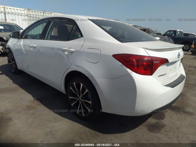 Photo 2 VIN: 5YFBURHE5JP744007 - TOYOTA COROLLA 