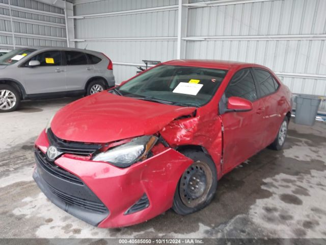 Photo 5 VIN: 5YFBURHE5JP749031 - TOYOTA COROLLA 